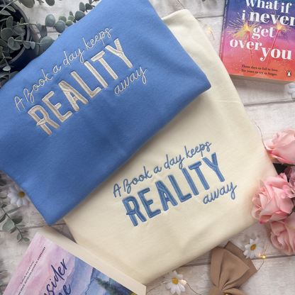 A Book A Day Keeps Reality Away