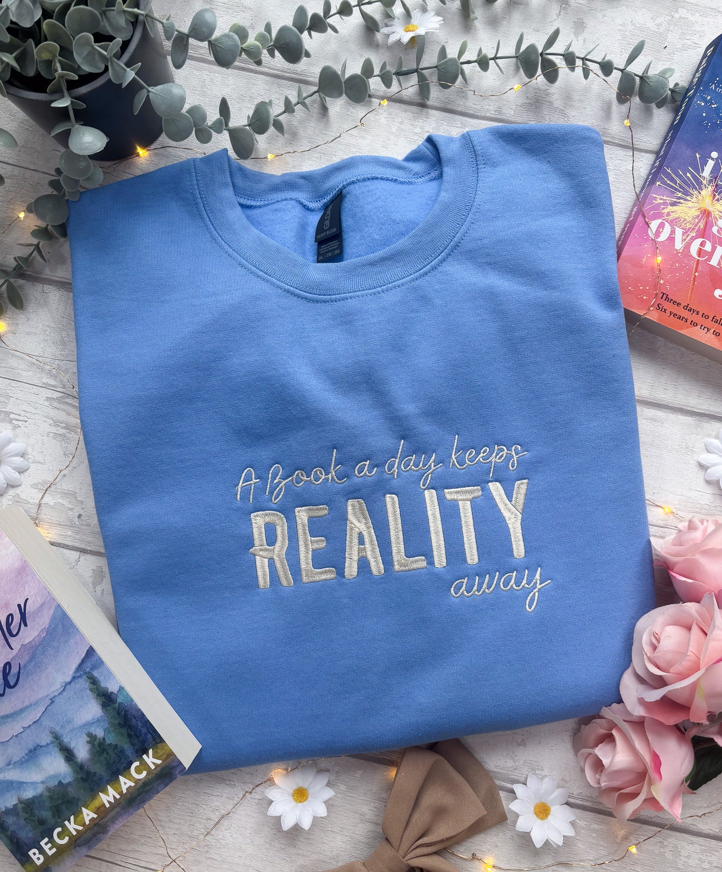 A Book A Day Keeps Reality Away