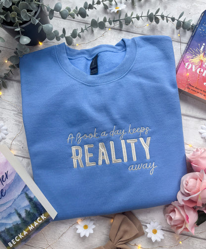 A Book A Day Keeps Reality Away
